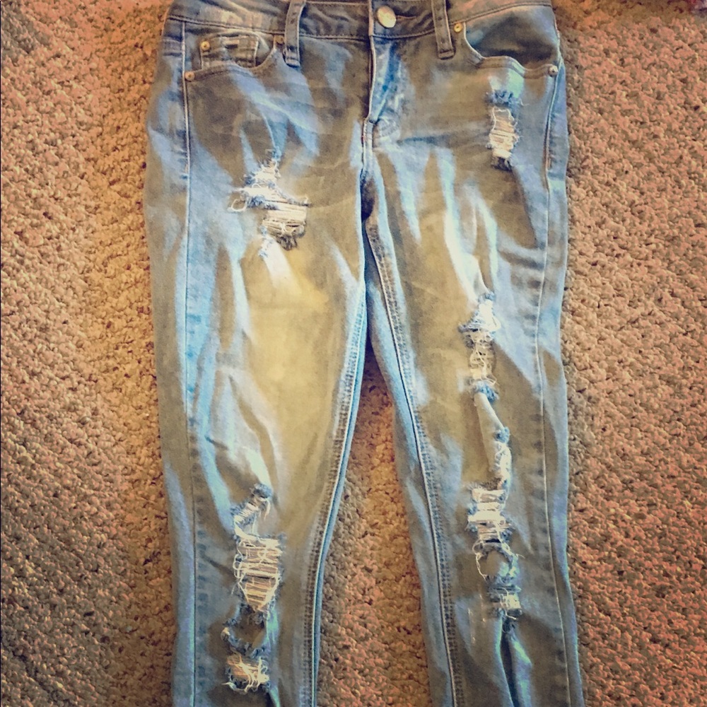 Distressed ripped jeans
